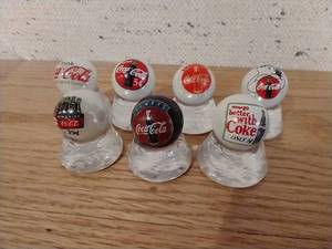 lot 243 image: (7) Coca-Cola Marbles & Glass Bases