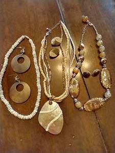lot 63 image: Shell Necklaces & Earrings