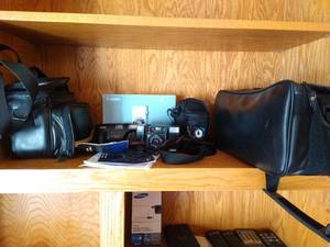 lot 387 image: Shelf Full of Cameras & Equipment