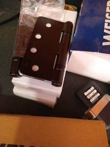 lot 564 image: Home Hardware Knobs, Hinges, Garage Door Openers, Locks