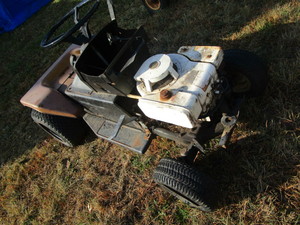 Farm & Fleet 1970 garden tractor, 7...