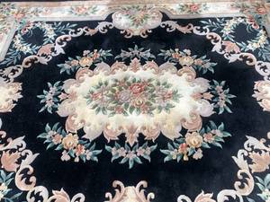 lot 3 image: Unique Oriental Rug with Floral Design on Black Background