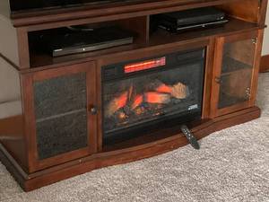 lot 195 image: Combination TVEntertainment Stand and Electric Fireplace