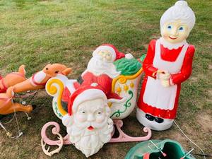 lot 134 image: Santa in Sleigh with Reindeer Light Up Blow Mold Holiday Decoration