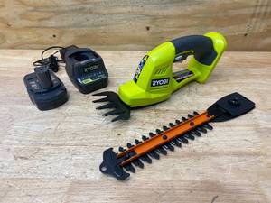 lot 22 image: RYOBI ONE 18V Cordless Battery Grass Shear and Shrubber Trimmer with 1.3 Ah Battery and Charger