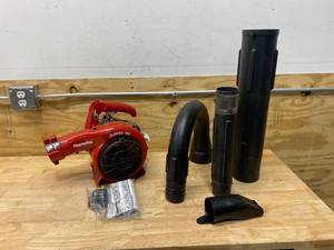 lot 83 image: HOMELITE 150 MPH 400 CFM 26cc Gas Handheld Blower Vacuum