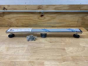 lot 92 image: EMODERNDECOR Shower Linear Drain 28 in. Brushed 304 Stainless Steel 2-sided Reversible Tile Insert Grate w Adjustable Leveling Feet