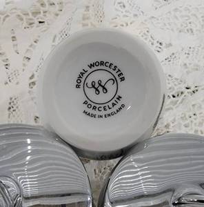 lot 62 image: Royal Worcester Porcelain Egg Coddlers, set of 4