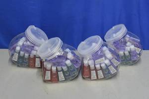 4 containers of various hand sanitizer