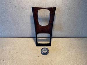 lot 12 image: 2001-2007 Mercedes C-Class Model Years, Shifter console trim cover and hood roundel ornament for Mercedes W203 Chassis