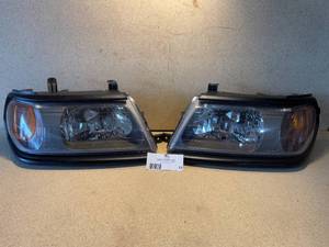 lot 13 image: 1997-2004 Mitsubishi Montero Sport Brand New Headlight Assemblies (Both LR)