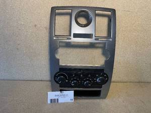 lot 15 image: 2005 Chrysler 300 Limited, Factory Dash Panel. Carbon-Fiber look, Radio bezel with HeaterAC control unit