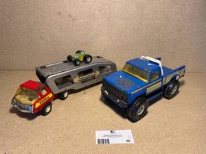 lot 48 image: Vintage Tonka Semi-Truck and Car Hauler Trailer, Nylite 4x4, and a Buddy-L Dune-Buggy. Steel construction and in good condition