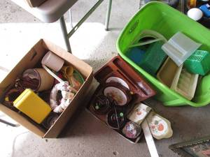 Overflowing tote of plastic contain...