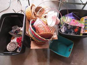 Two covered totes heaping with bask...