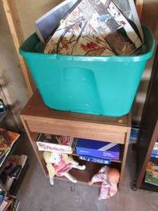 Covered tote with misc toys and wal...
