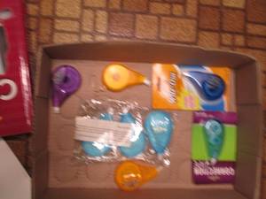File box of office supplies. Writin...