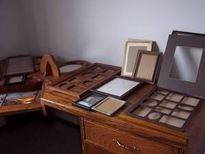 Several picture frames in a tote w...
