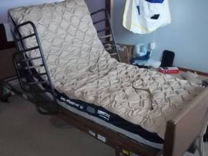 Hospital bed w adjustable firmness...
