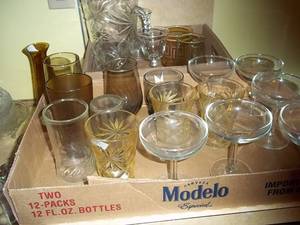 Glass pitcher and several glasses (...