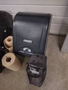 Lot of towels and soap dispensers...