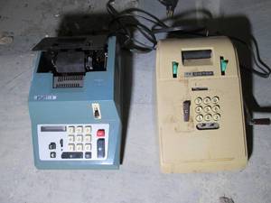 2 Vintage adding machines...