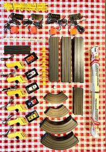 lot 23 image: Model race car set in covered tote....