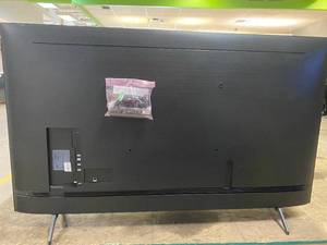 lot 995 image: UN65TU7000F Samsung - 65 Class 7 Series LED 4K UHD Smart Tizen TV (TECHNICIAN TESTED LIKE-NEW)