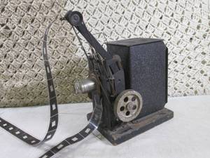 lot 61 image: (FS) Antique Keystone Moviegraph...