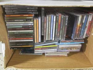 lot 121 image: (RM4) Box Full of CDs and 3-Ring B...