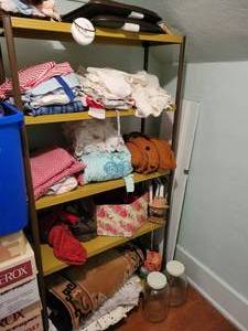 lot 78 image: Vintage Metal Shelf w Contents - Linens, Vacuum, Red Hats, Hamper, Hangers and More - NO SHIPPING