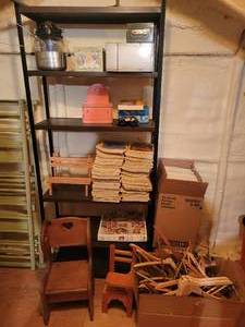 lot 85 image: Vintage Metal Shelf w Contents - Collector Plates, Wood Hangers, National Geographics, Small Wood Chair, Doll Desk and More - NO SHIPPING