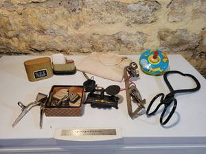 lot 112 image: Antique Kriss Kross Blade Sharpener, Vintage Schick Razor, Scissors, Cast Iron Balance Scale, Tin Top, Tongs and More