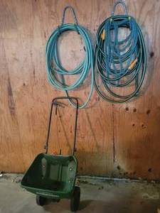 lot 204 image: Garden Hoses and Seed Spreader - NO SHIPPING