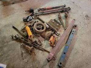 lot 250 image: Pile of Assorted Tractor Parts - Drawbar Hitches and More- NO SHIPPING