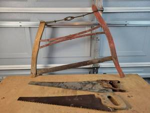 lot 282 image: Antique Buck Saw and (2) Hand Saws