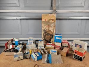 lot 374 image: Large Lot of Mostly NOS Tractor Parts - Ford, IH and More