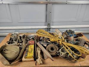 lot 383 image: Huge Lot of Assorted Parts - Muffler Clamps, Extension Cord, Strap, Tractor Parts, Small Rail Anvil and More - NO SHIPPING