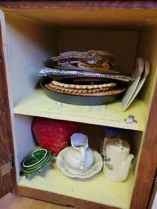 lot 53 image: Contents of 2 Kitchen Cupboards - Pampered Chef Items, Cookie Jars, LinensTrivets, Gadgets, and MORE NO SHIPPING