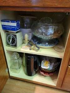 lot 54 image: Contents of Kitchen Cupboard - Cookie Stamps, Cookie Cutters, Spoon Rests, Coffee Carafes, and Much, Much MORE NO SHIPPING