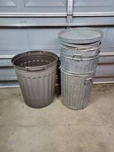 lot 148 image: (3) Galvanized Steel Trash Cans w Lids and (1) Poly Trash Can - NO SHIPPING