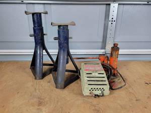 lot 153 image: Pair of Jack Stands, 1-12 Ton Bottle Jack, and Marquette Bantam Booster, Jr. Battery Charger - NO SHIPPING