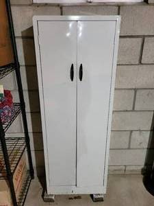 lot 335 image: White 2-Door Metal Cabinet with Arts & Crafts Supplies - NO SHIPPING