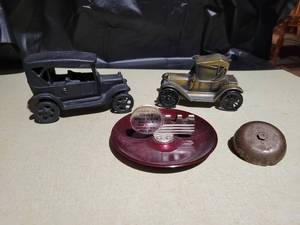 lot 346 image: Cast Iron Car, Promotional Ash Tray, Promotional Car Coin Bank, and Bell