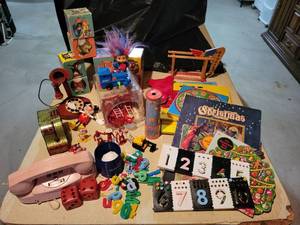 lot 352 image: Large Lot of Vintage Toys - MARX Benjamin Franklin Thrift Bank, Toy Telephones, Firefighters, Kaleidoscope, Playskool Puzzles, and MORE