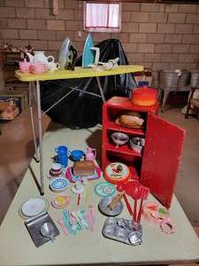 lot 355 image: Vintage Mommy and Me Lot - Ironing Board, Cabinet with Vintage Cooking Toys, Includes Mary Poppins Tin Set, Kiddie Kitchen Set, and MORE