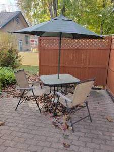 lot 358 image: Patio Table, Umbrella, and Two Folding Chairs - NO SHIPPING