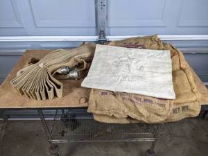 lot 228 image: Vintage Burlap Sacks and Vintage Fire Hose