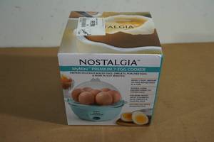 lot 50 image: NEW Nostalgia Premium 7 Egg Cooker