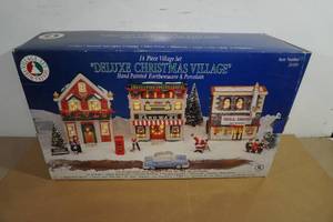 lot 213 image: Trim Trends 14 Piece Deluxe Christmas Village Set